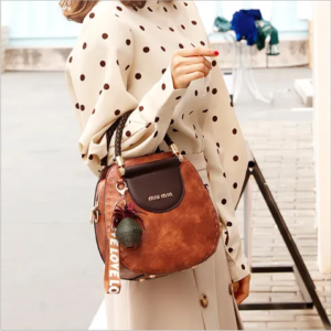 Oval Shape Ladies Miv Min Bag. (Brown Color.)